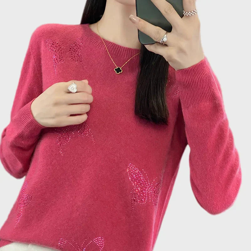 Cuello vuelto de punto con diseño de mariposa