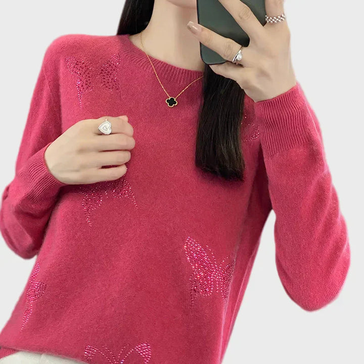 Cuello vuelto de punto con diseño de mariposa
